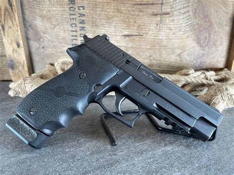 Sig Sauer P226 Navy 4.4" 9mm, in original case - harveysauctions.com