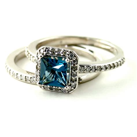 blue topaz cushion cut engagement ring | OneWed.com