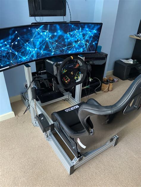 The ultrawide and Racing Sim Rigs UK setup is soooo clean. Polished off ...