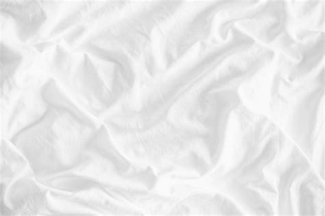 White wrinkled fabric texture rippled surface, close up unmade bed sheet in the bedroom Photo ...