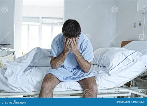 Desperate Man Sitting at Hospital Bed Alone Sad and Devastated Sick in Clinic Stock Image ...