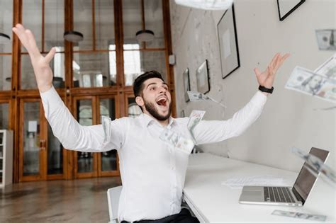 Premium Photo | Happy man throwing money in the air