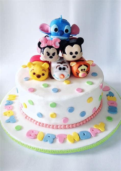 Tsum tsum birthday cake with Stitch, Minnie, Mickey, Pooh, Olaf, and Tigger rice Cereal treat ...