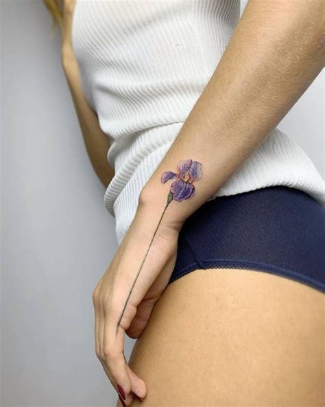 Iris flower on the left hand. | Beautiful flower tattoos, Hand tattoos ...