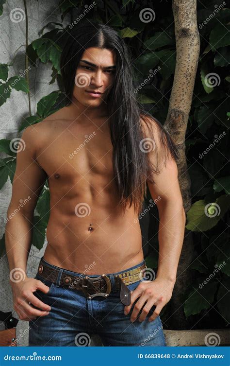 Male Model in Tropical Greenhouse Stock Photo - Image of american ...