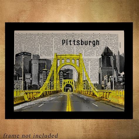 a yellow bridge with the word pittsburgh on it in black and white, over ...