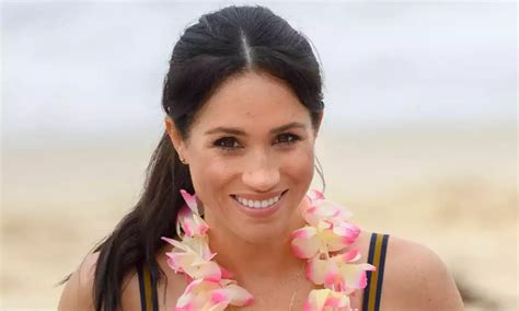 Meghan Markle emerges from outdoor swim in candid photo