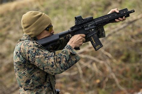 A U.S. Marine Corps advanced marksmanship training program instructor ...