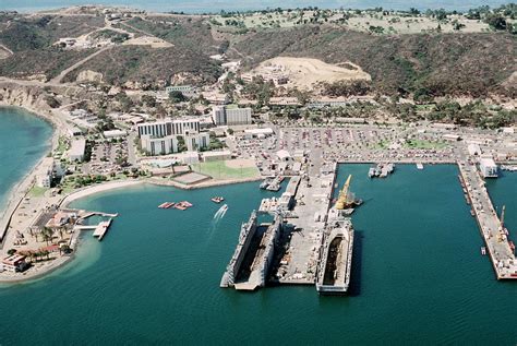 An aerial view of the Point Loma submarine base with two floating dry docks, center, during ...