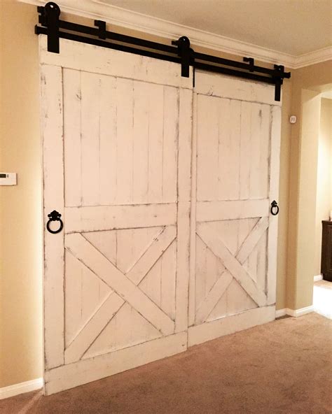 Distressed White Barn Doors with Bypass Hardware for a Bar Room | Barn doors sliding, Interior ...