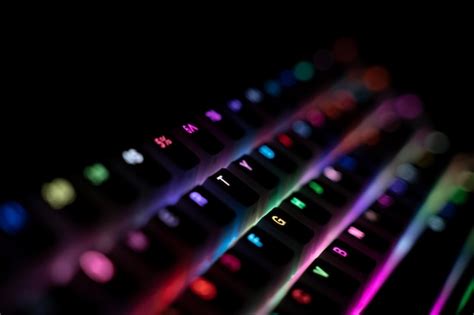 Premium Photo | Side view of illuminated rgb keyboard in the dark