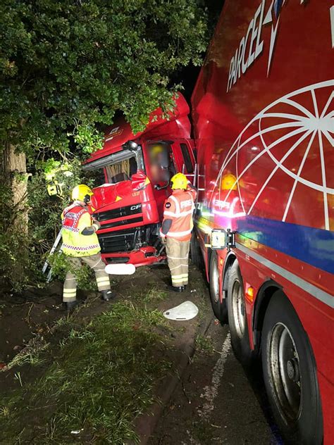 Articulated lorry driver trapped after crash which saw other driver leave scene - despite having ...