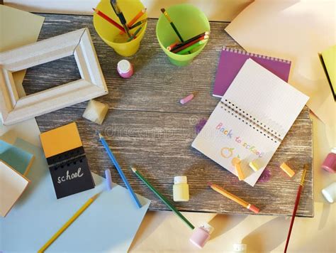 Notebook, Art and Stationery Materials, a Frame on a Wooden Table Stock ...