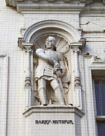 The statue of Harry Hotspur on the fascia of a building on ...