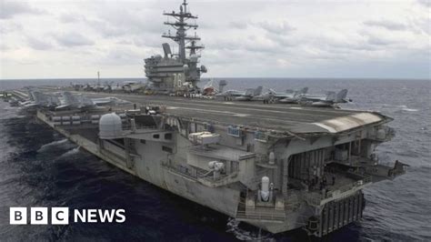 US Navy aircraft crash: Eight rescued off Japanese coast - BBC News