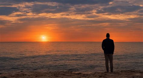 a man thinking while looking at the horizon on a sunset | Stable Diffusion