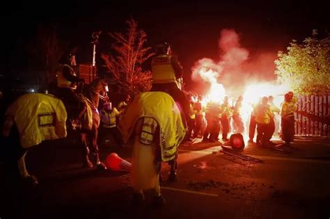 BREAKING Legia Warsaw fans launch objects at police ahead of Aston ...