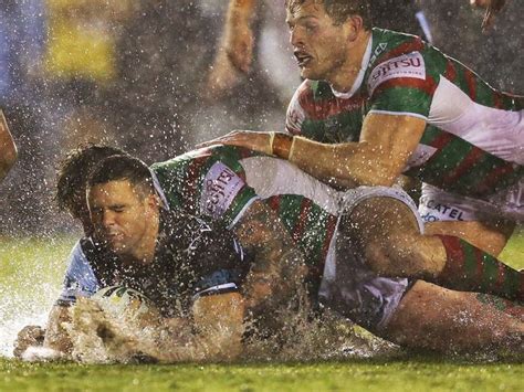 Sharks v Rabbitohs in pictures: Incredible images as Cronulla, South Sydney brave big wet at ...