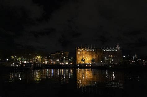 Premium Photo | Amsterdam canals cruise at night