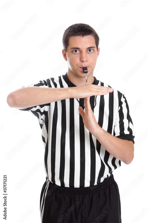 Teen basketball referee giving sign for technical foul Stock Photo | Adobe Stock