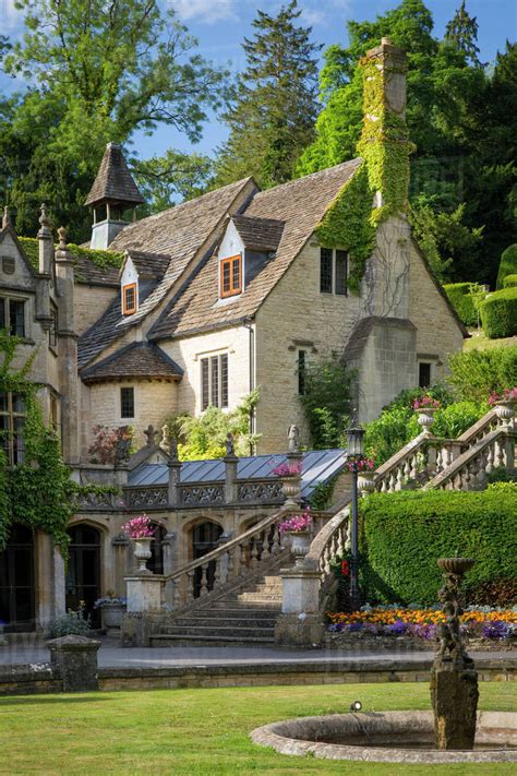 Manor House Hotel, Castle Combe, the Cotswolds, Wiltshire, England - Stock Photo - Dissolve