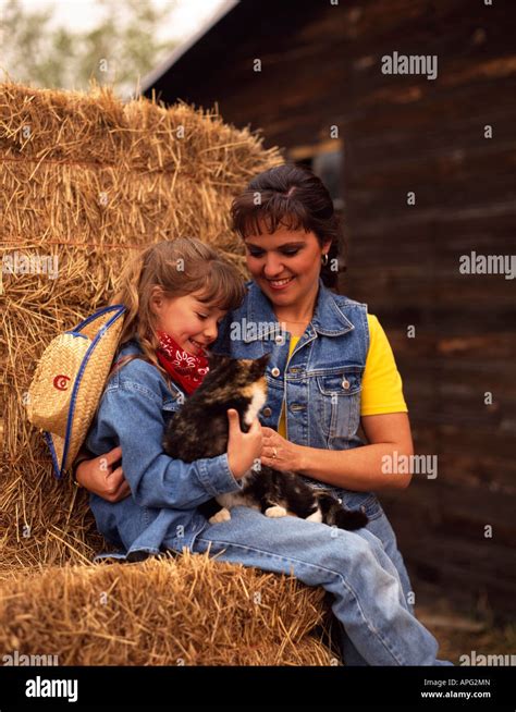 Playing with a puppy Stock Photo - Alamy