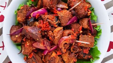 The tastiest Asun Recipe (Spicy Goat Meat) - YouTube