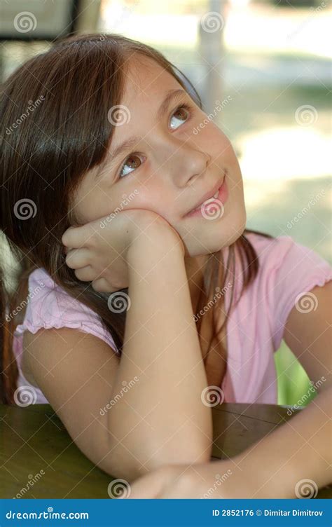 Little girl dreaming stock photo. Image of blue, books - 2852176