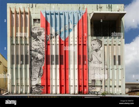 Graffiti of children composing the Puerto Rico flag Stock Photo - Alamy