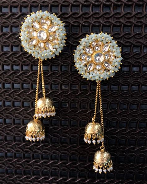 Turquoise pearl tassel jhumka by Kripaa Pranay | The Secret Label