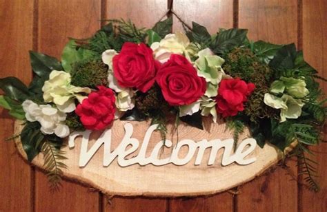 welcome sign decorated with flowers door decor front door