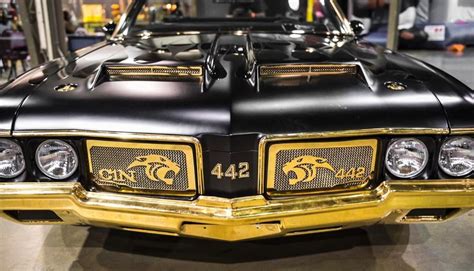 LOOK: Cam Newton's insane gold-plated car on display