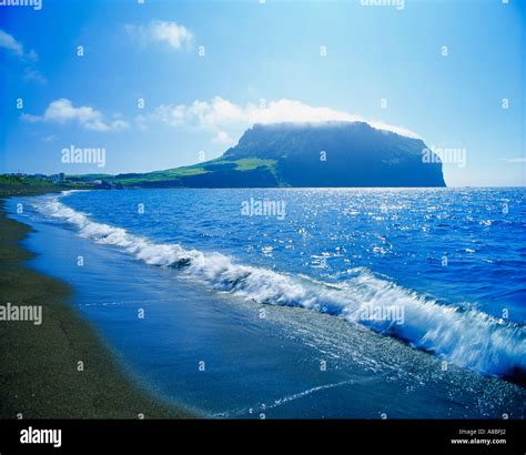 Jeju Island Sunrise mountain and Sea Stock Photo - Alamy