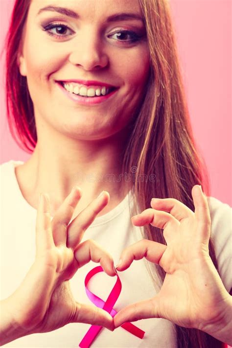 Breast Cancer. Woman Making Heart Shape on Pink Ribbon Stock Image ...