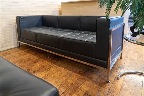 Mid-Century Modern Black Leather Sofa • Peartree Office Furniture