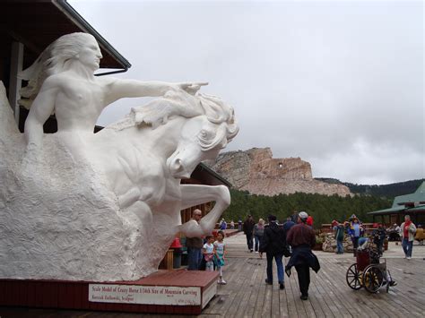 Crazy Horse statue in front. The actual carving (in progress) in the ...