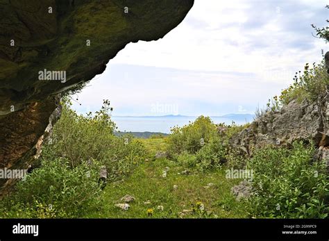 View from the entrance of Cave of Kreshmoi near Konispol Stock Photo - Alamy