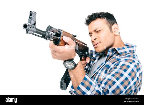 young african american man holding rifle and shooting isolated on white Stock Photo - Alamy