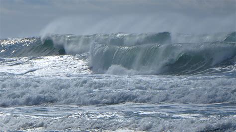 Distant Storm/Oregon Coast | Sun, Water and Stone