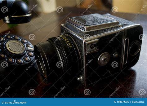 Old Camera Nearby an Ancient Telephone Stock Image - Image of telephone, antique: 108872725