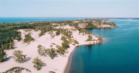 Sandbanks Provincial Park comes with breathtaking dunes and white sand ...