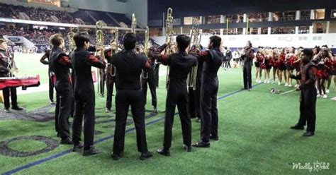 Mind blowing marching band routine involves trombones, extreme timing, and some close calls