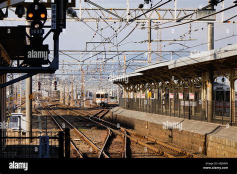 Tokyo, Japan - Dec 25, 2015. A JR train running on track and coming to the station in Tokyo ...