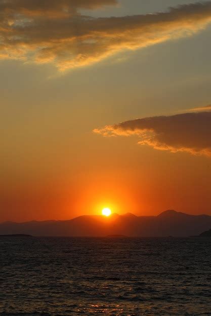 Premium Photo | Sunset on the beach seaside town of turgutreis and ...