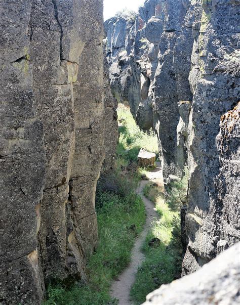 Footpath along two mile 'Crack in the Ground', Oregon.[2336 x 2973][OC] : r/EarthPorn