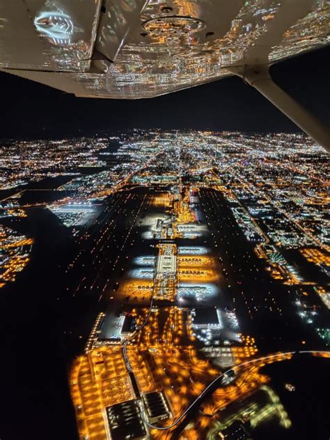 A photo of Phoenix Sky Harbor taken during my night flight : r/aviation