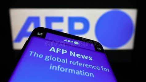 Mobile Phone with Website of News Agency Agence France-Presse (AFP) on ...