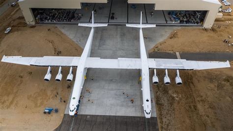 Stratolaunch, the world's largest plane, emerges from its hangar for ...