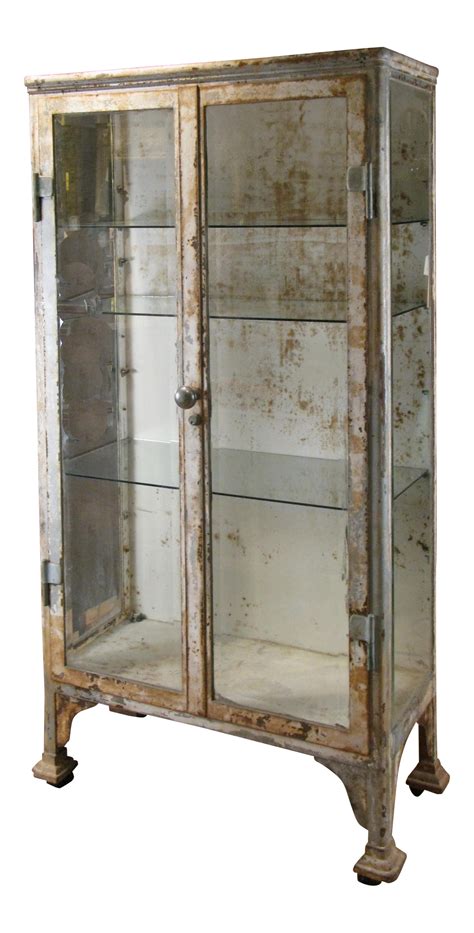 Antique Cast Iron & Glass Apothecary Cabinet on DECASO.com | Glass cabinet doors, Glass cabinets ...