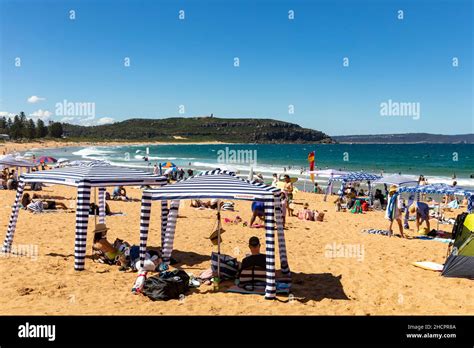 Palm Beach in Sydney, summers day and many people at the beach to enjoy ...